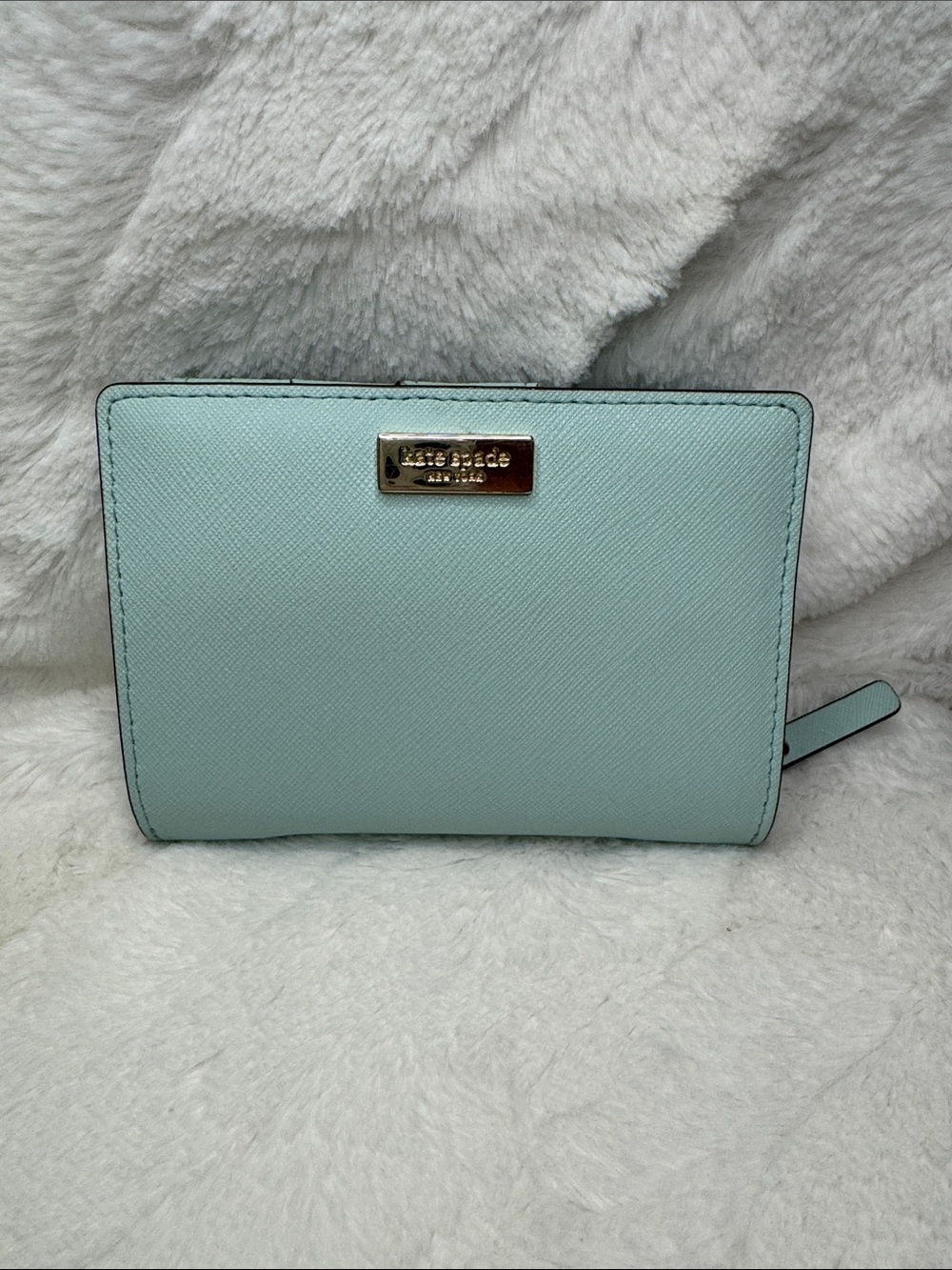 kate spade pastel mint zip-around Saffiano wallet with gold plaque